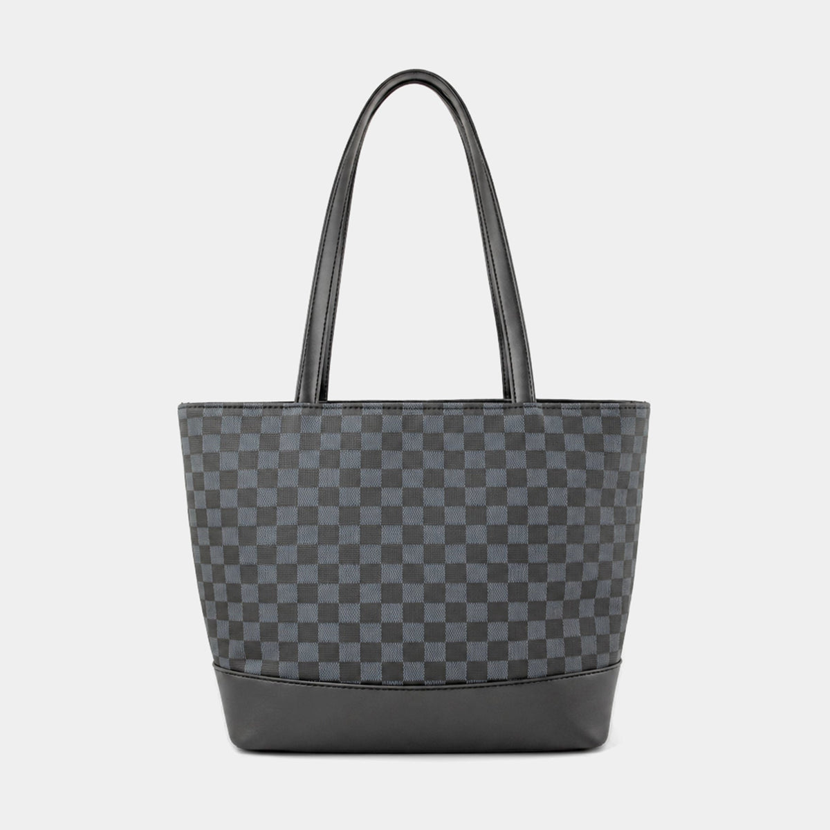 A dark gray and black checkerboard patterned tote bag with black leather handles and a black base, shown against a light gray background.