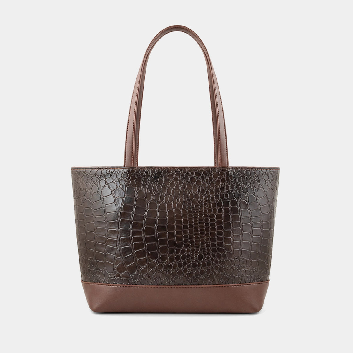 A dark brown tote bag with a crocodile-embossed texture on the main body and smooth brown handles and base, shown against a light gray background.
